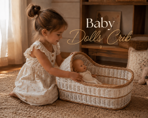 Luxury wicker baby dolls crib with natural woven finish, perfect for pretend play, nursery styling, and doll accessories.