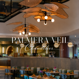 Palmera Veil Chandelier featuring elegant handwoven rattan mesh “leaf” panels arranged in a floating organic design. This luxury statement pendant chandelier casts a warm ambient glow above a sophisticated modern restaurant interior, blending tropical artistry, natural textures, and contemporary coastal elegance.