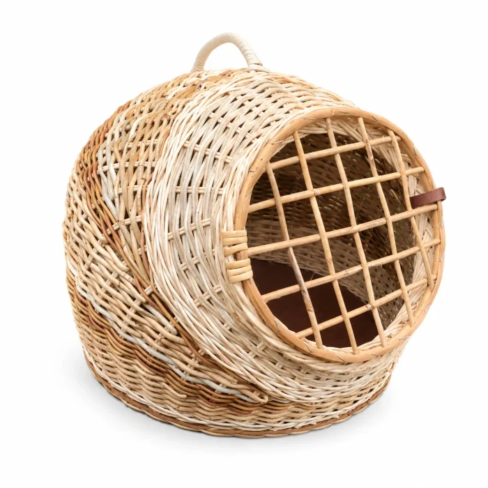 Handcrafted rattan cane cat basket with enclosed woven design and natural finish